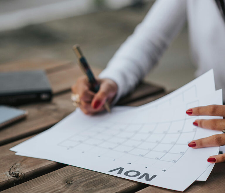 Professional writing on calendar