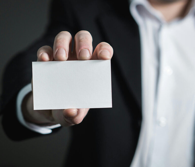 Man holding empty business card