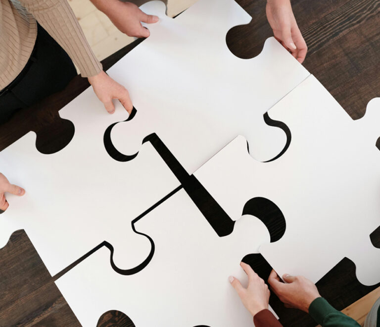 Puzzle pieces fitting together
