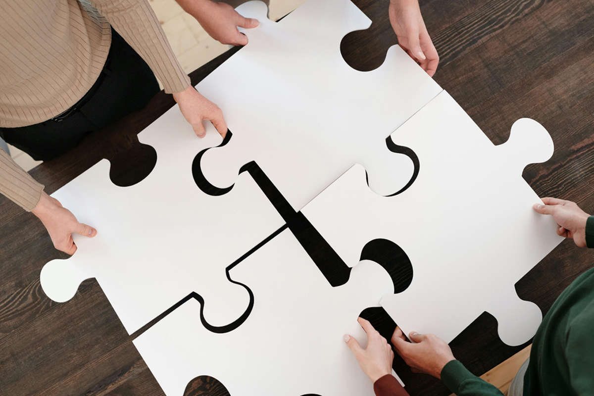 Puzzle pieces fitting together